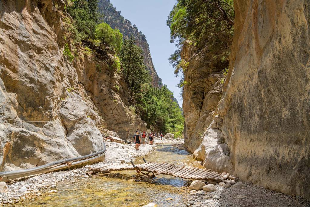 Tourists crossing Samaria Gorge in Chania.