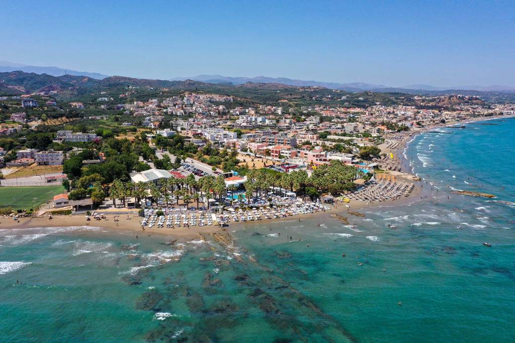 Beach bars with sunbeds in Agia Marina Beach.