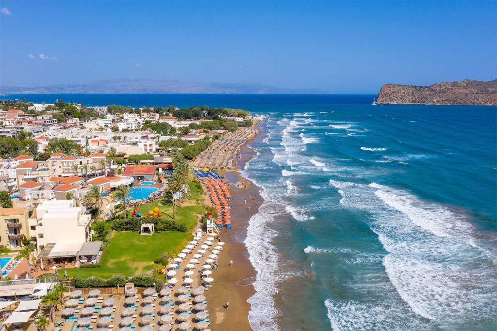 Hotels and sunbeds by Agia Marina Beach.
