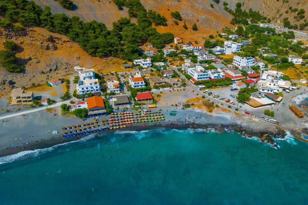 Seaside hotels, bars, and cafes in Agia Roumeli Beach.