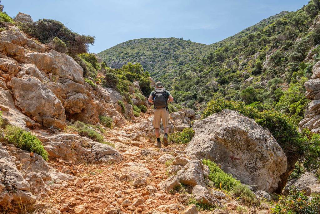 A man crosses the path of Stavros to find Avlaki Gorge.