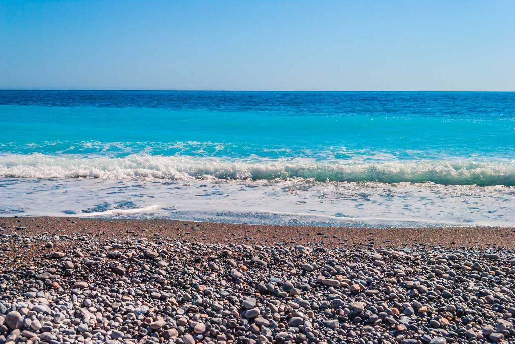 Pebbles on the coast of Domata Beach.
