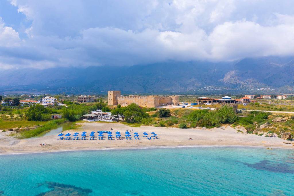Sunbeds in Frangokastello beach, a few meters away from Frangokastello Castle.