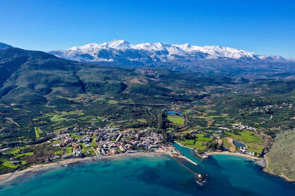 Snow-covered mountains above the village of Georgioupolis in Chania.