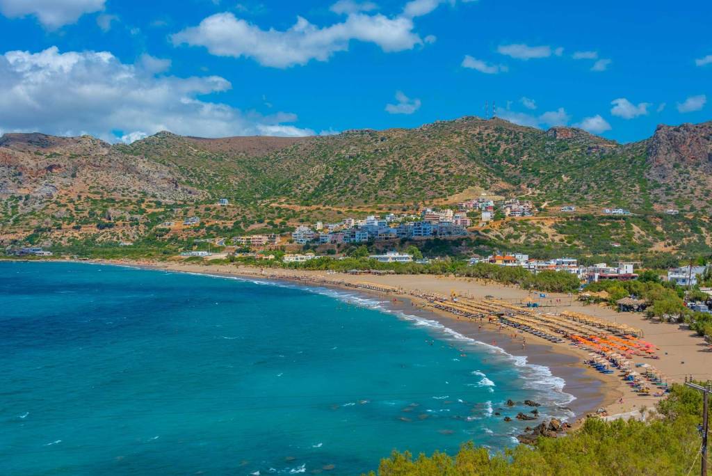 Sunbeds and umbrellas in Pachia Ammos Beach.