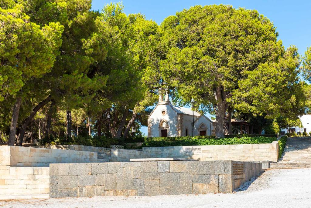 The church of Prophet Elias by the Venizelos Graves and the green trees.