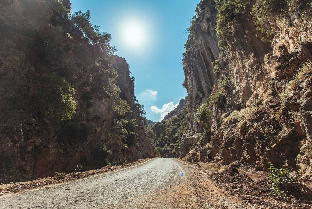 A road leading to Therisso Gorge in Chania, below the Greek Sun.