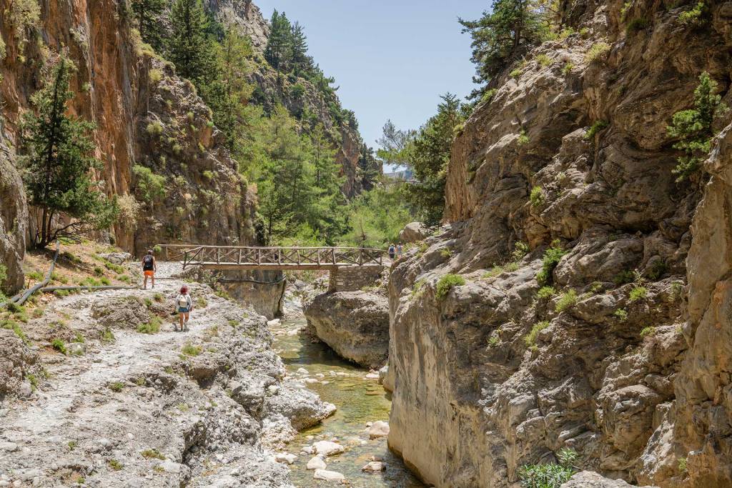 Tourists cross a bridge in Samaria Gorge.