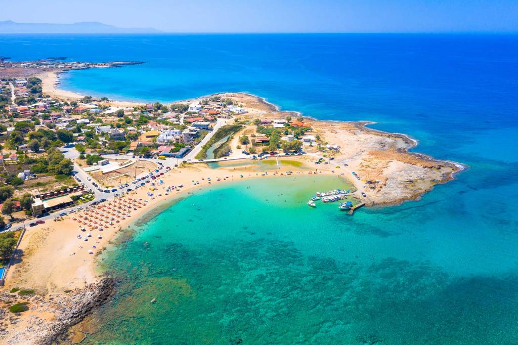 Aerial view of Stavros Beach and its small port.
