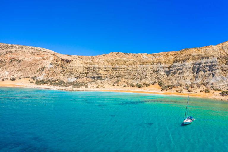 A catamaran sails from Potamos Beach in Gavdos.