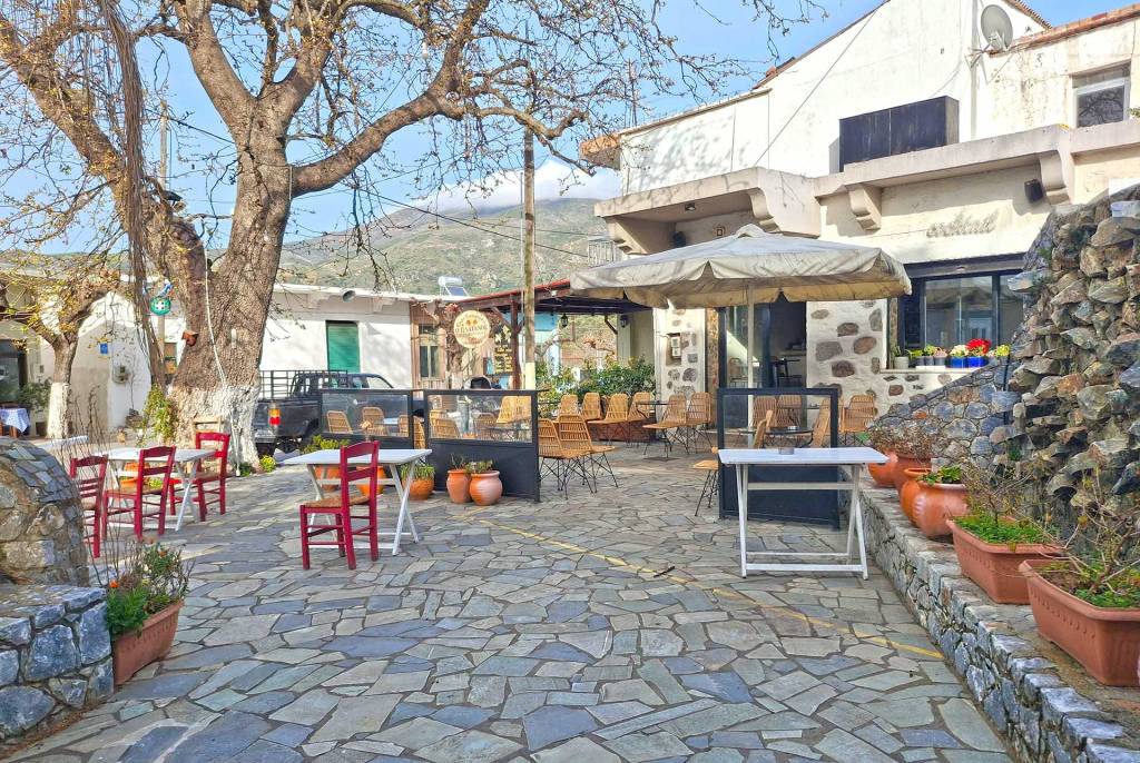 The square of Kandanos Village has small cafes and a pastry shop.