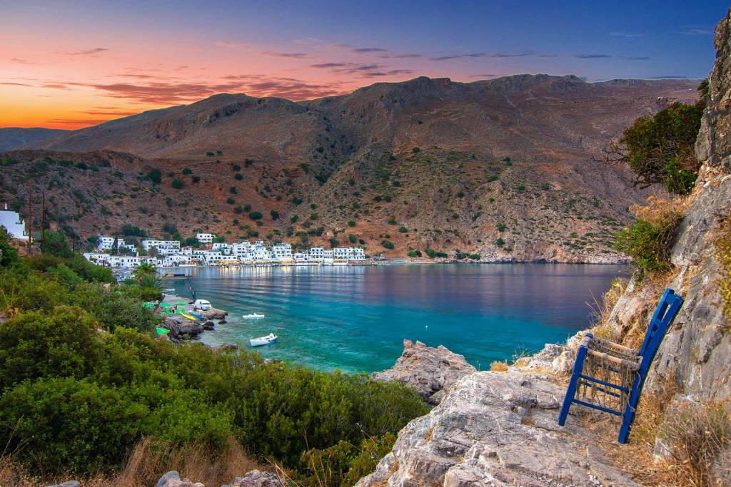 Romantic sunset view of Loutro Village.