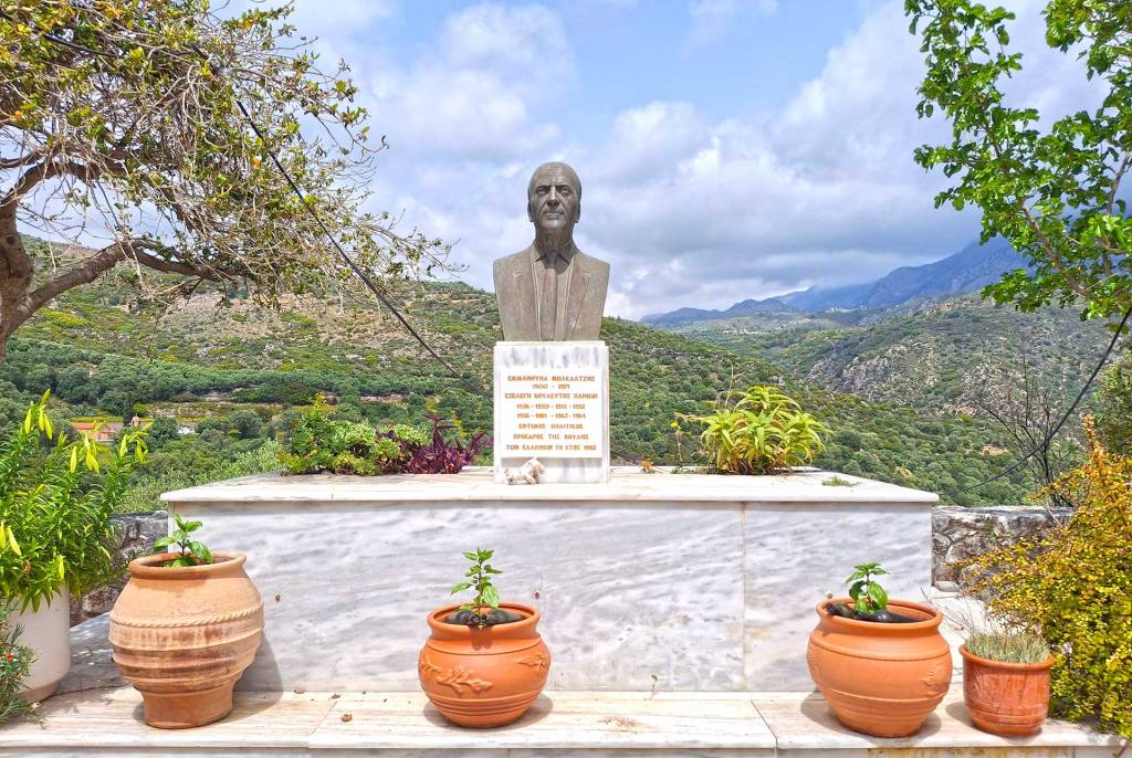 A statue in the square of Moni Village.