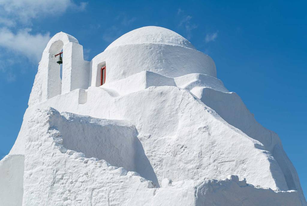The picturesque white-washed Panagia Paraportiani Church in Mykonos.