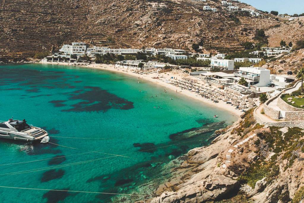 A luxury yacht in Psarou Beach, on Mykonos Island.