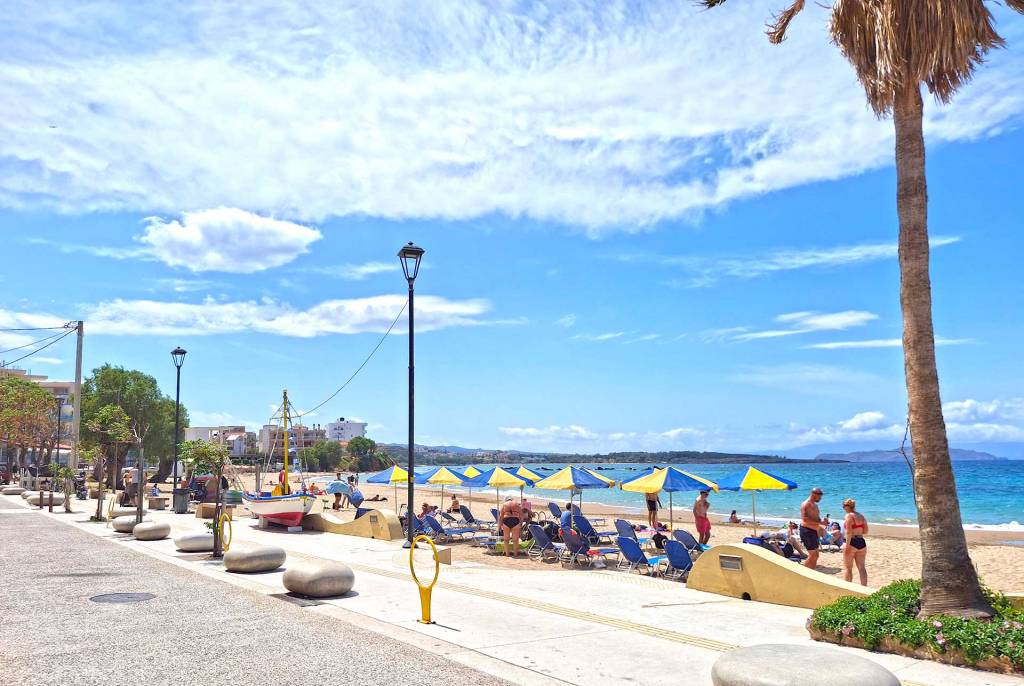 Umbrellas and sunbeds in Nea Chora Beach.
