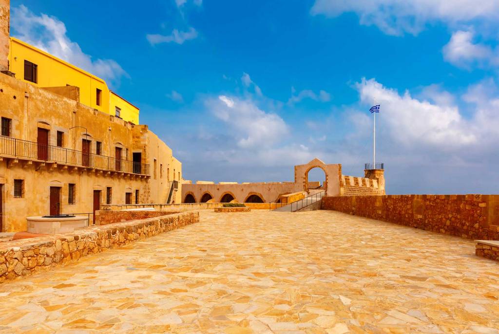 The Greek Flag in Firkas Fortress, located in Chania Old Harbor.