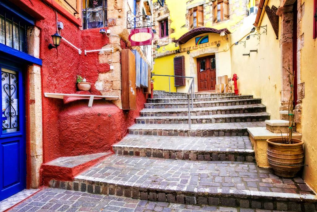 A colorful street with stairs in Chania Old Town.