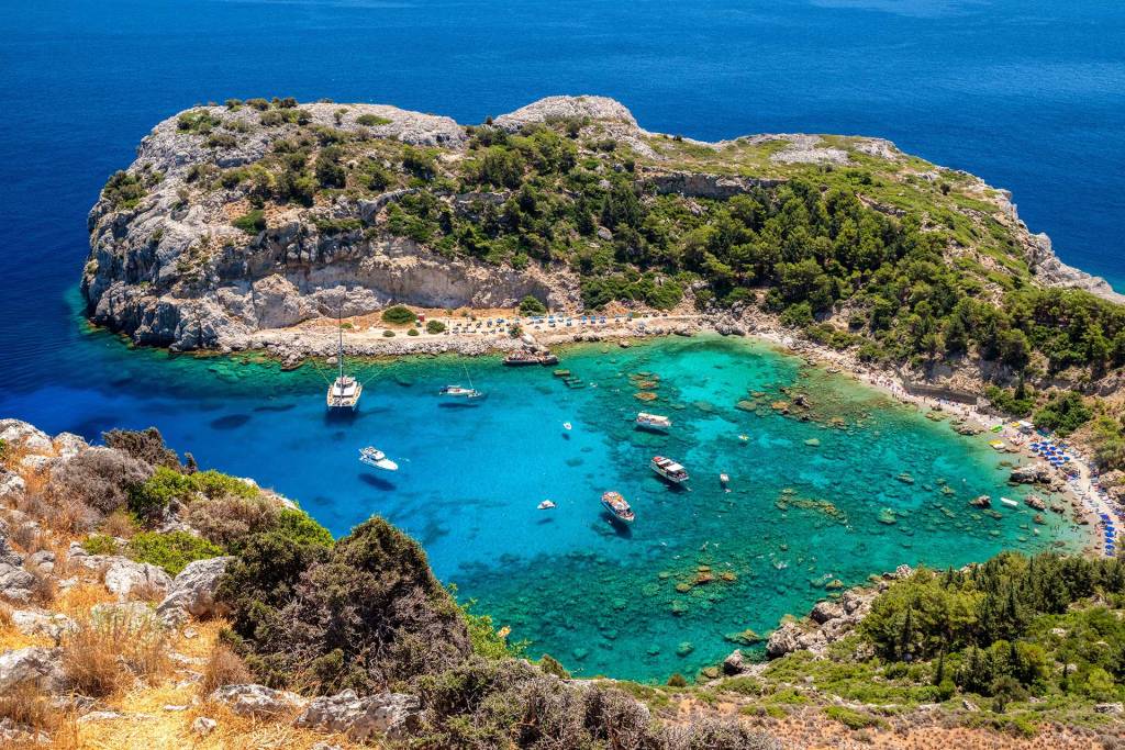 Sailing boats in Anthony Quinn Bay, on Rhodes Island.