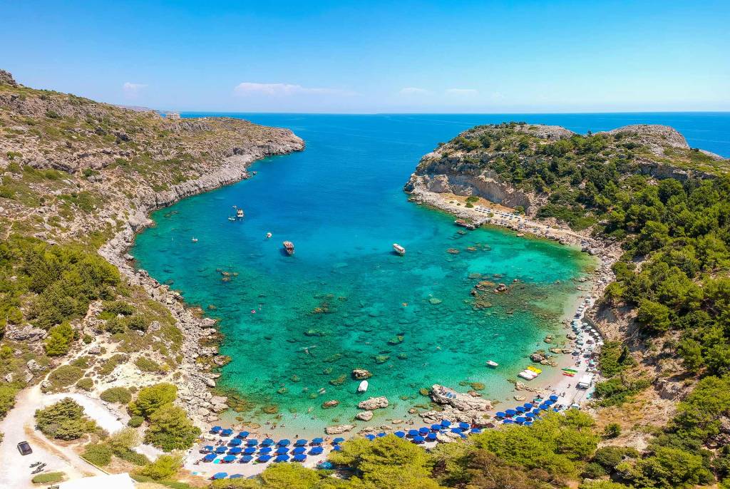 Sunbeds in Anthony Quinn Beach, in Rhodes.