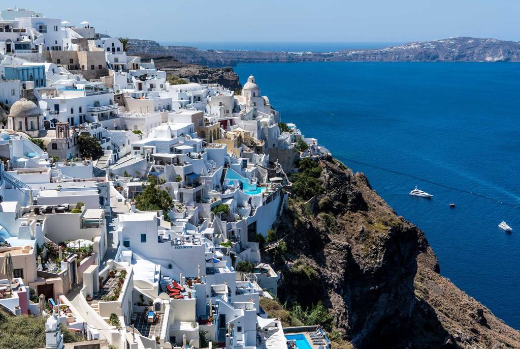 Houses, luxury hotels, and traditional buildings in Imerovigli Village (Santorini).