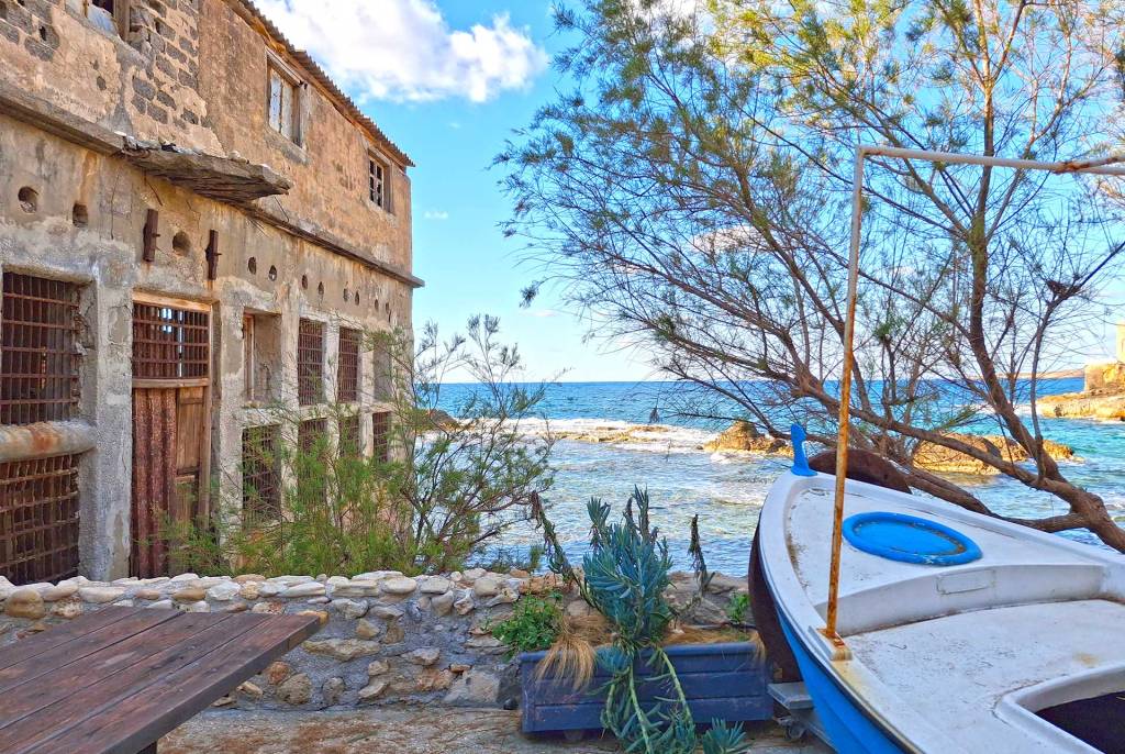 A seaside home and a fishing boat in Tabakaria.