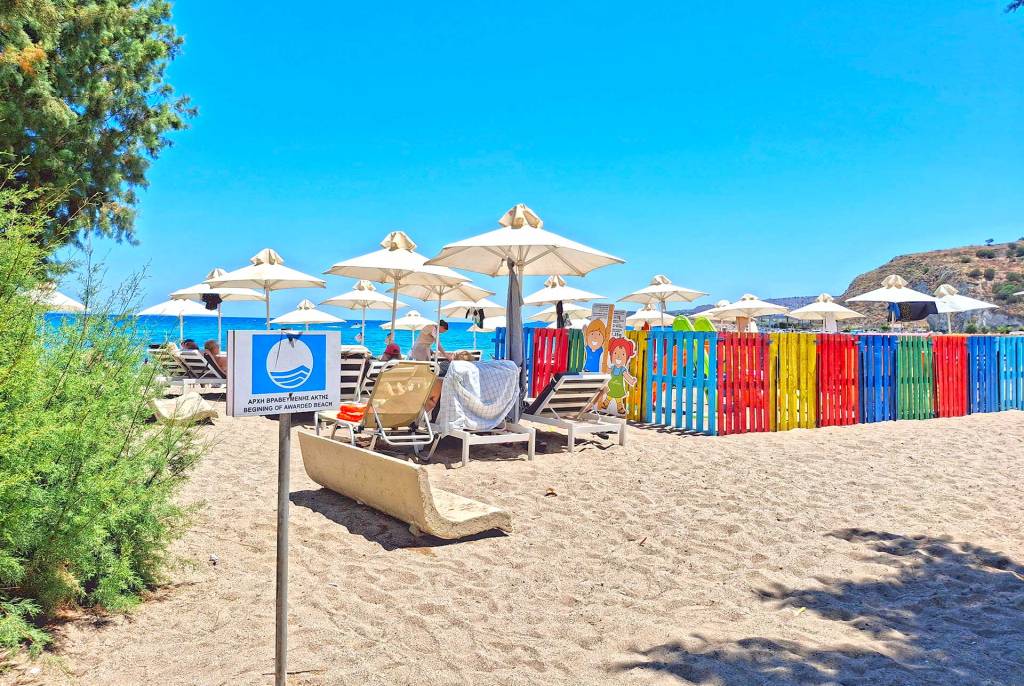 The awarded part of Kalyves Beach, where sunbeds, umbrellas, and a playground are found.