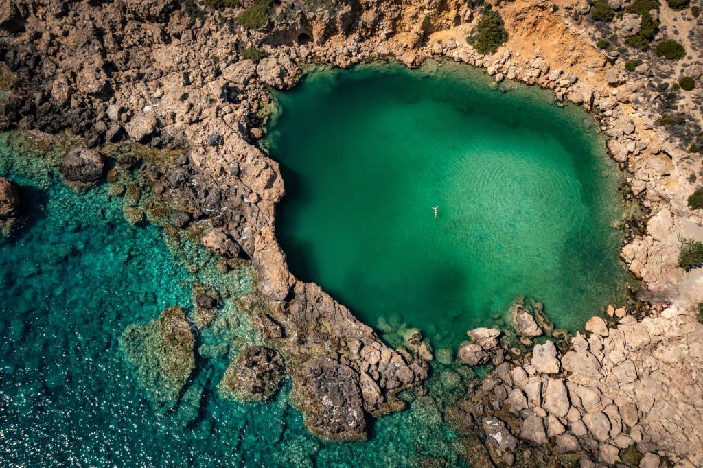 A woman swims in Voulolimni.