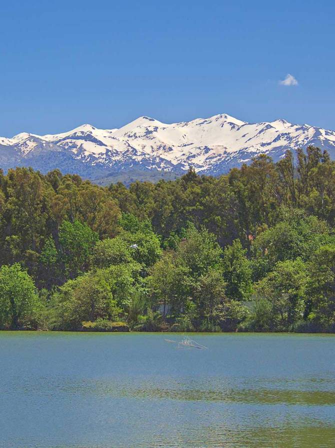 Snow in the mountains above Agia Village and Agia Lake.