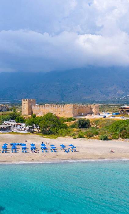 Sunbeds in Frangokastello beach, a few meters away from Frangokastello Castle.