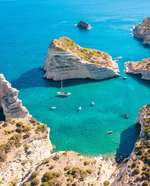 Catamarans in Kleftiko Bay of Milos Island.