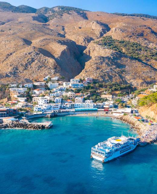 A ship in the port of the seaside Chora Sfakion Village.