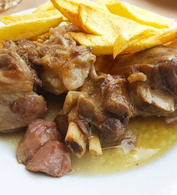 Antikristo and fries in Therisso Village.
