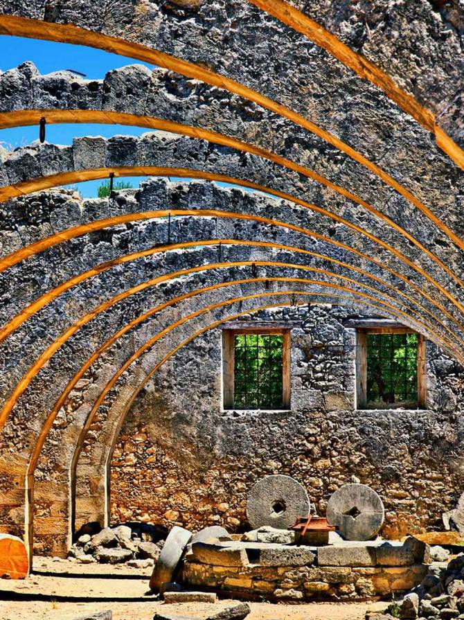An abandoned olive press near Vamos Village.
