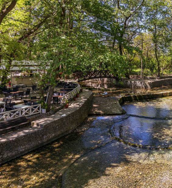 Riverside cafes in Vrysses.